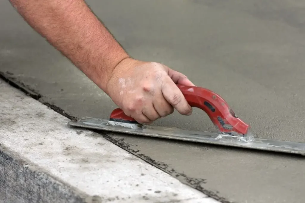 Man levelling concrete