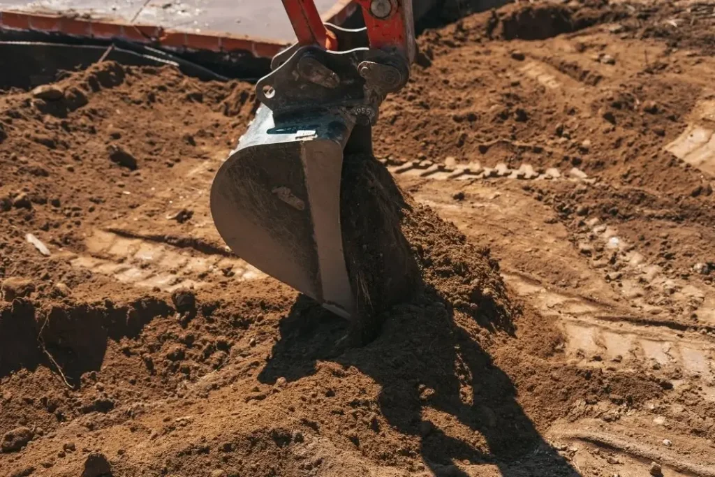 excavating ground for site prep